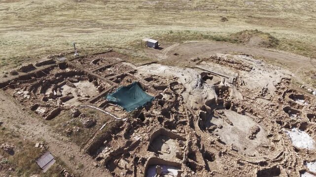 Cinematic Drone Flight Over Karahantepe Archaeological Site in Sanliurfa, Turkiye &ndash; Ancient Neolithic Heritage from Above