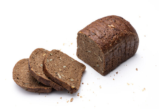 Sliced dark rye whole grain bread loaf with three slices isolated on white background