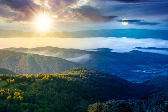 foggy carpathian mountain landscape. day meet night. outdoor adventure with stunning view. sun and moon in harmony over mountainous countryside of ukraine on summer solstice. rolling hills