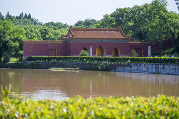 Fototapeta premium Traditional Chinese heritage building by pond at Ming Tombs, Zhongxiang, Hubei, China