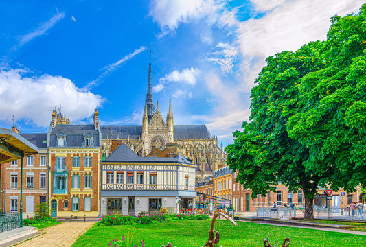 Amiens city old historical centre with traditional houses, Cathedral Basilica of Our Lady Notre-Dame Amiens, Square Jules Bocquet, blue sky background, Hauts-de-France Region, Northern France
