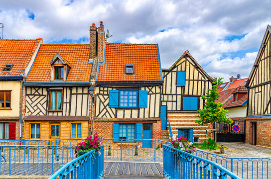 Traditional fachwerk houses in Saint-Leu quarter in Amiens historical city centre, typical historical quarter and buildings with shutter windows, Hauts-de-France Region, Northern France