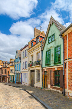 Colorful houses of Amiens historical city centre Saint-Leu quarter. Narrow cobblestone cozy street with multicolored bright walls of buildings, Somme department, Hauts-de-France Region, France