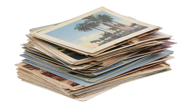 Stack of vintage postcards with palm trees and tropical scenes, isolated on transparent background
