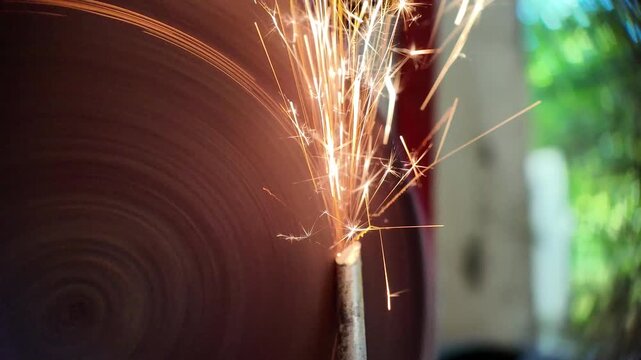 Close-up view of sharpening. 4K Metal Spark.