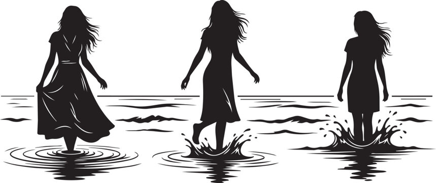 Silhouettes of women walking through water at the beach during daytime