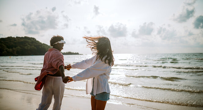 Couple embracing trust and deep connection, enjoying a peaceful and harmonious relationship on beach