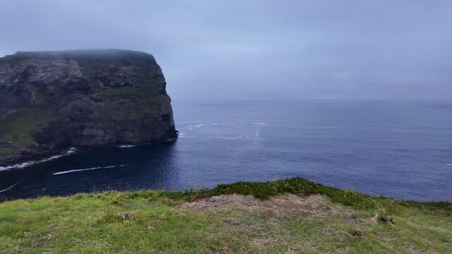 Azores, Faial Island, Morro de Castelo Branco. Scenic views of dramatic coastal cliffs, volcanic landscapes, and the rugged natural beauty of this iconic Atlantic coastline.