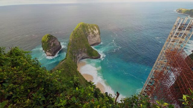 Elevated View of Kelingking Beach With Turquoise Ocean and Dramatic Coastal Landscape in Slow Motion