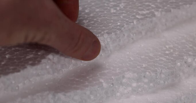 soft white foam for storage, foam sheet made of small soft balls for storing objects and transporting them, selective focus