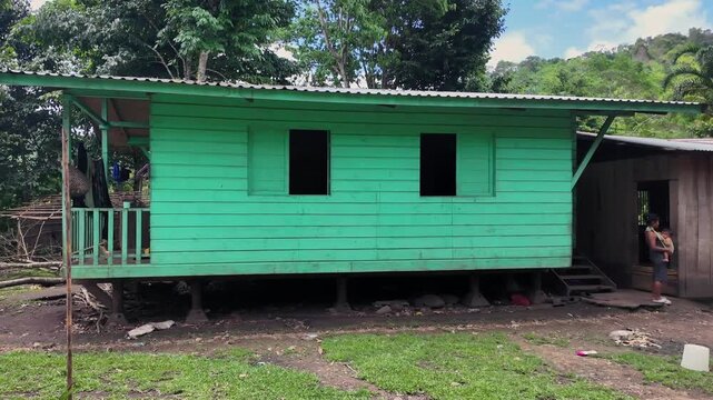 Rural indigenous community living in traditional wooden house