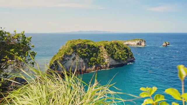 Panoramic View of Diamond Beach on Nusa Penida with Turquoise Water Limestone Cliffs and White Sand Shoreline