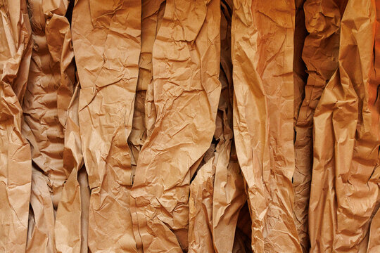 Crumpled brown kraft paper texture abstract packaging background