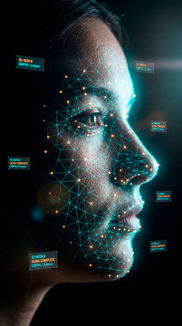 Female face with glowing biometric scanning mesh and depth data on dark background