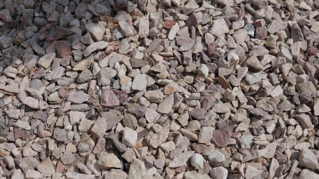 gravel stone texture top view for construction background with crushed rocks and natural aggregate surface