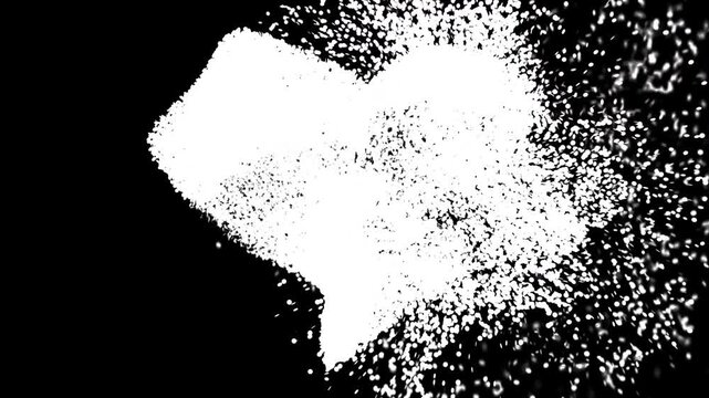 Abstract Heart Shape Dissolving Into Particles on Black Background.