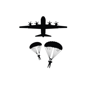 Silhouette of a transport airplane with two paratroopers jumping down