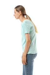 Obraz premium Young woman with poor posture standing sideways