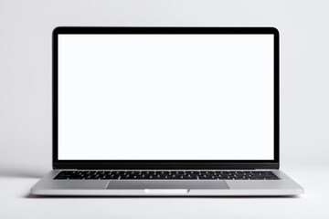 Fototapeta premium Laptop computer mockup with blank white screen on a minimal digital device display