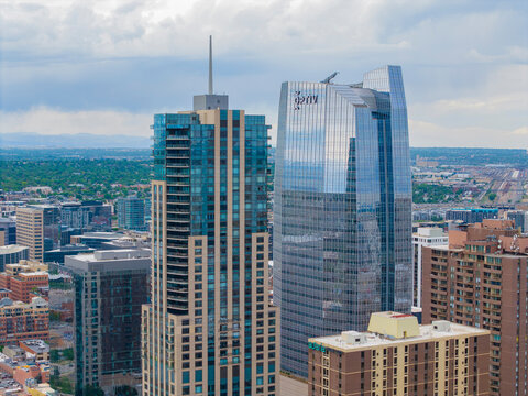 Denver modern city skyline aerial view including OPTIV building and Four Seasons Hotel building in downtown Denver, Colorado CO, USA. 