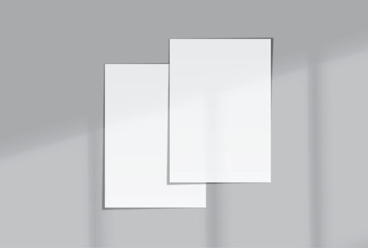 Blank white A4 paper sheets mockup on background with elegant organic shadow overlay. Perfect for displaying stationery designs, flyers, posters, branding, Ads and print design presentations