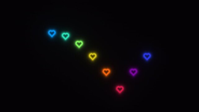 Bright hearts form a rainbow in dark background with glowing effect