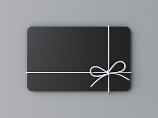 Fototapeta premium Blank black business gift card mock up with white rope bow isolated on gray background with shadow minimal conceptual 3D rendering