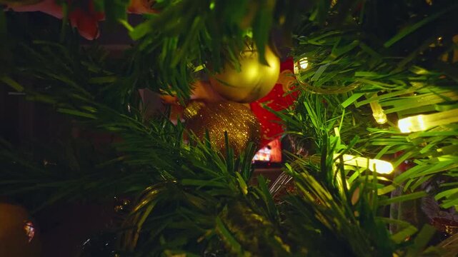 Creative View From Inside a Christmas Tree Framing a Cozy Fireplace Through Illuminated Evergreen Branches and Glowing Holiday Ornaments, Warm Christmas Atmosphere
