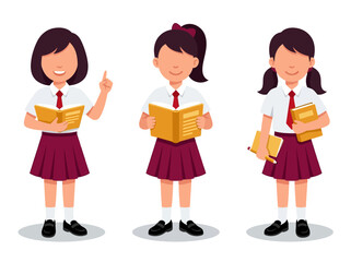 Fototapeta premium Schoolgirls in uniform holding books vector illustration