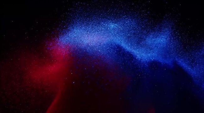 Colorful powder explosion background with abstract red cloud wave shape against dark space dynamic splash vibrant dust texture particle energy motion art design backdrop