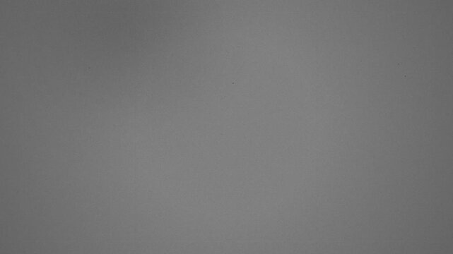 Monochromatic Charcoal Slate Noise Loop for Industrial Backdrop and Minimalist Design Surface 4k video