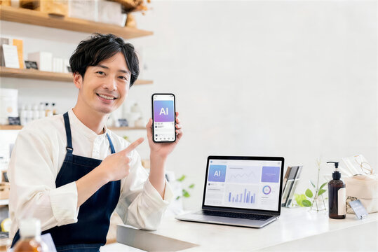 飲食店で生成AIによる予約やメニュー対応を確認する日本人スタッフ