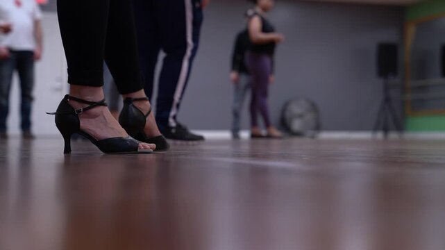 Argentine Tango Dancers Feet on Dance Floor