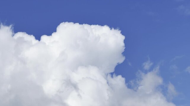 Cumulus clouds are clouds that have flat bases and are often described as puffy, cotton-like, or fluffy in appearance. Waikiki, City of Honolulu, Oahu, Hawaii. Trade Wind