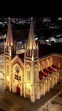 Night Sagrado Coracao De Jesus Cathedral At Petrolina In Pernambuco Brazil. Dom Malan Square. Downtown City. Illuminated Church. Sagrado Coracao De Jesus Cathedral In Petrolina. City At Night Skyline.