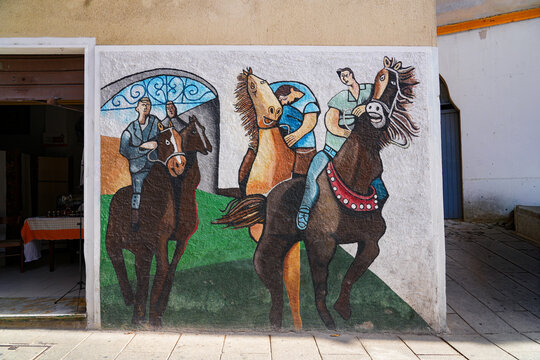 Street mural painting in Orgosolo, Sardinia, Italy