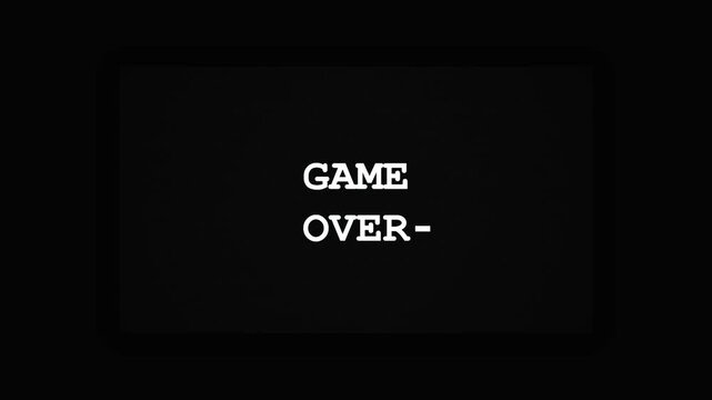 Retro Glitch Game Over Text Animation on Black Background 4K Motion Graphic with Chromatic Aberration