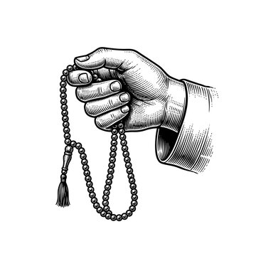 Vintage engraving of a hand holding a string of prayer beads