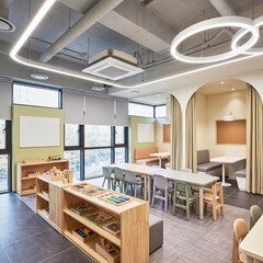 Fototapeta premium Modern school cafeteria study corner with flexible tables