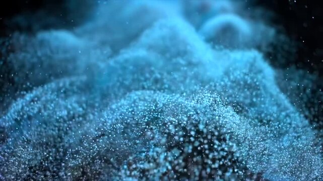 Abstract blue particle wave forming soft flowing shapes, thousands of tiny glowing dots rising and dispersing in dark space, creating a futuristic data cloud or fluid simulation effect