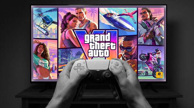 Theft Auto VI cover art on TV screen with PS5 DualSense controller held by hands