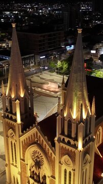 Night Sagrado Coracao De Jesus Cathedral At Petrolina In Pernambuco Brazil. Dom Malan Square. Downtown City. Illuminated Church. Sagrado Coracao De Jesus Cathedral In Petrolina. City At Night Skyline.
