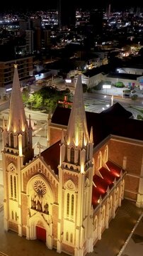 Night Dom Malan Square At Petrolina In Pernambuco Brazil. Sagrado Coracao De Jesus Cathedral. Illuminated Church. Downtown District. Dom Malan Square At Petrolina In Pernambuco. City At Night Skyline.