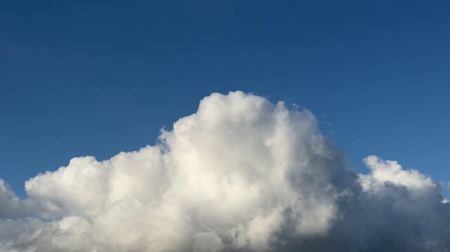 Time lapse of Cumulus congestus (also known as towering cumulus). in Waikiki, Honolulu, Oahu, Hawaii. Trade winds. Cumulus clouds are low-level clouds