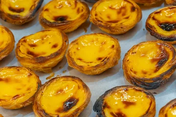 Several freshly baked Portuguese custard tarts © f11photo