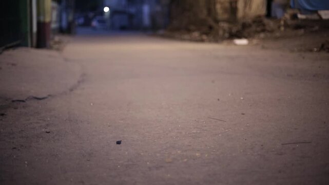 Slow-motion footage capturing an object being thrown onto the ground, highlighting movement, impact, and dynamic action in a detailed cinematic shot.