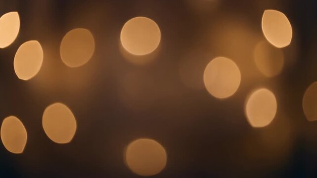 Warm golden bokeh light spots background.