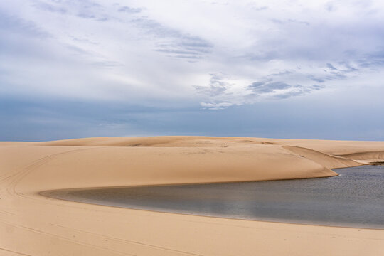 Dunes and lagoons of Atins, Lencois Maranhenses, Barreirinhas, Brazil. White sand dunes with pools of fresh water