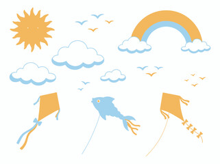 Fototapeta premium A collection of colorful kites flying in the sky with clouds and a rainbow.