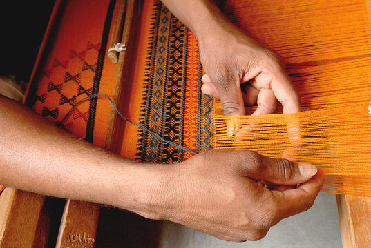 hands of the weaver